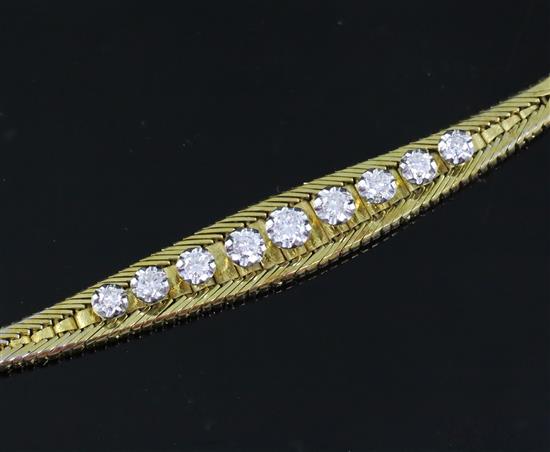 A mid 20th century Italian 18ct gold and graduated illusion set nine stone diamond set bracelet, by Zoccai, Vicenza, 18.5cm